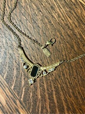 1928 Gold-Tone Black Stone Ornate Pendant Necklace